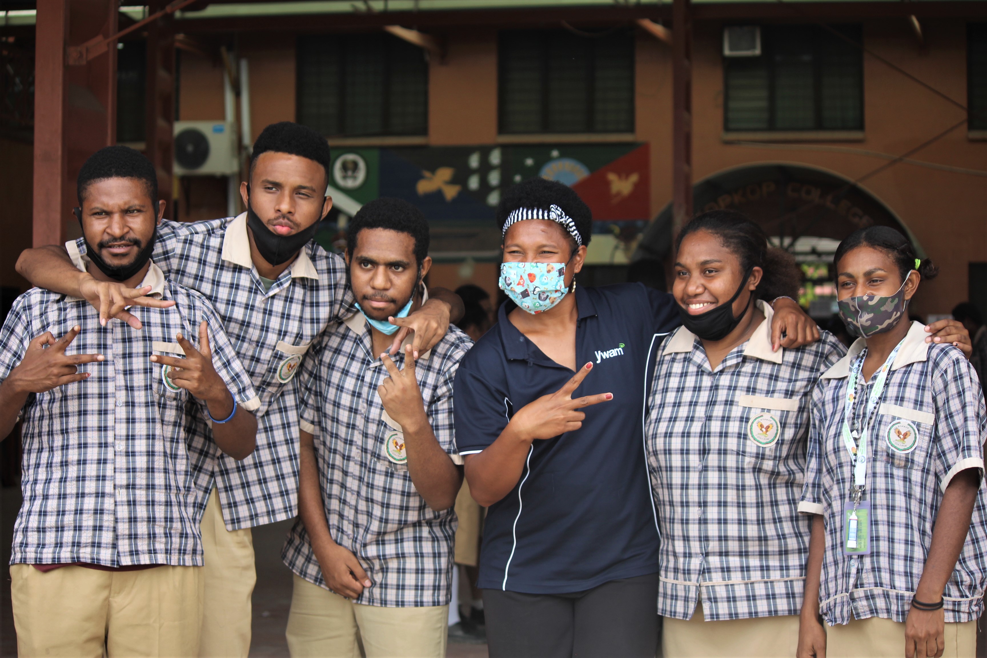 Ywam Member Poses For Photoshoot With Kopkop College Secondary Students After Seminar 